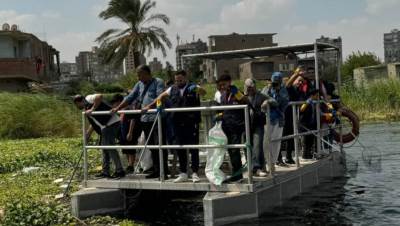 بنك saib ينظم يوما تطوعيا لتنظيف مياه النيل بجزيرة القرصاية بالجيزة