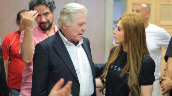 النجم حسين فهمي والمنتجة آلاء لاشين